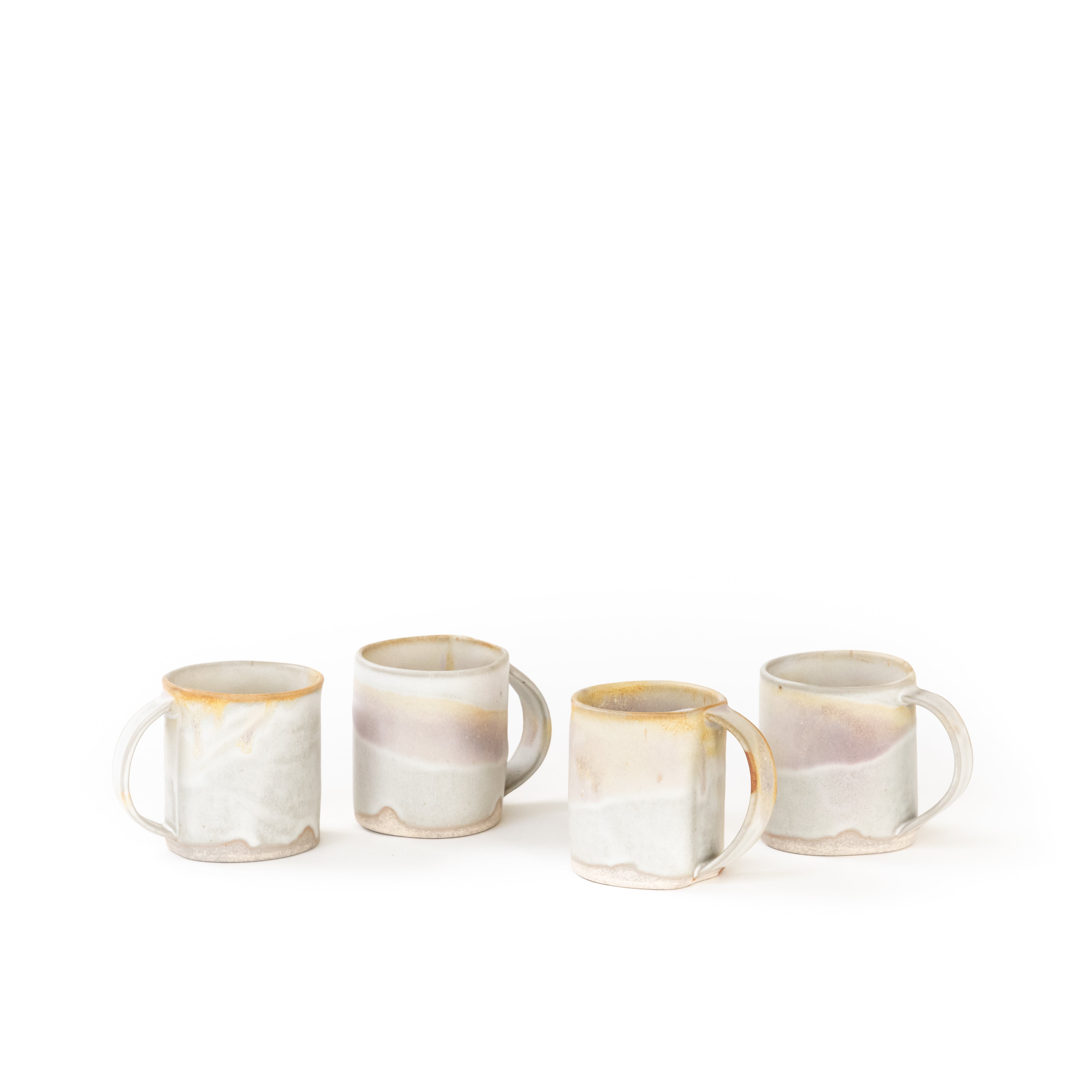 A Set Of Four Small Sea Ranch Mugs