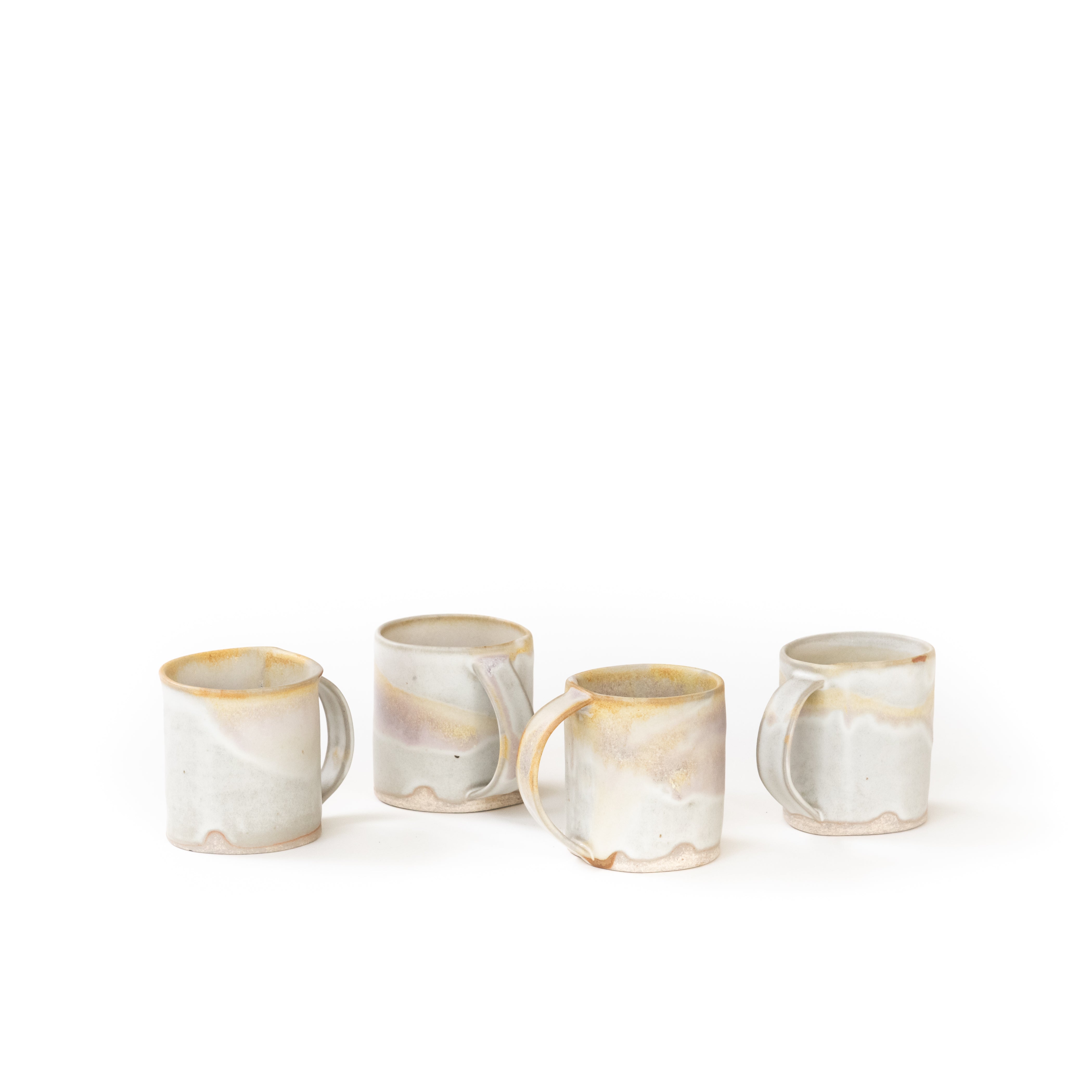 A Set Of Four Small Sea Ranch Mugs