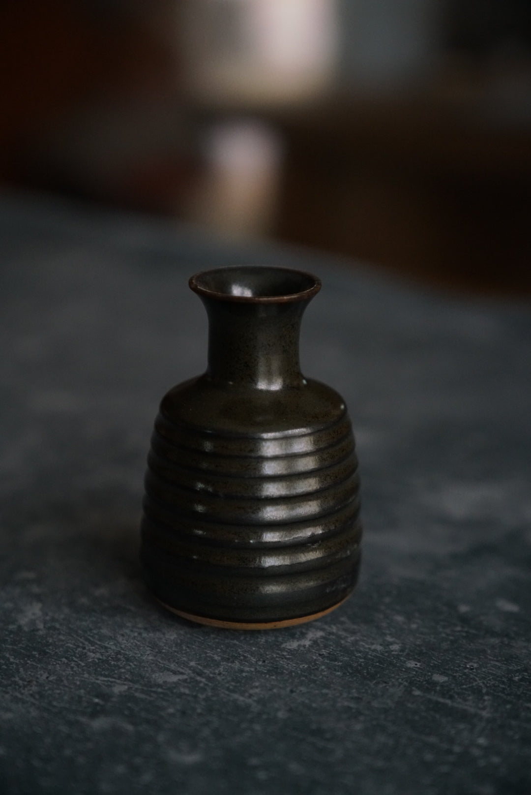 Small Dark Ribbed Vase